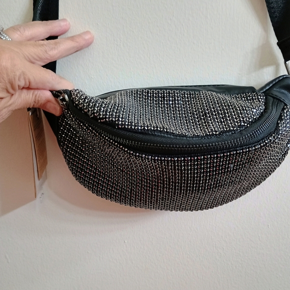 Sleek Black and Silver Satchel with Modern Design - Picture 1 of 7